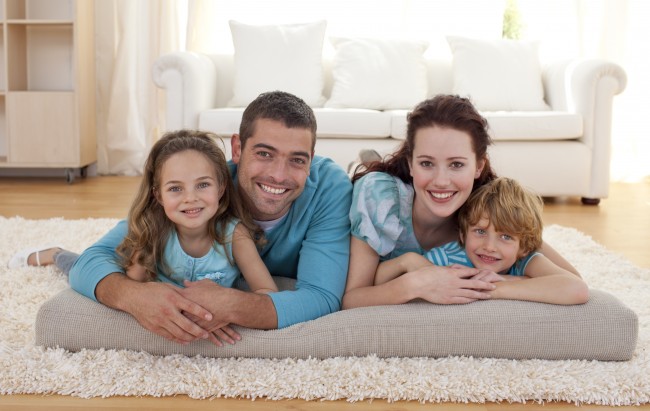 Family on floor in living-room